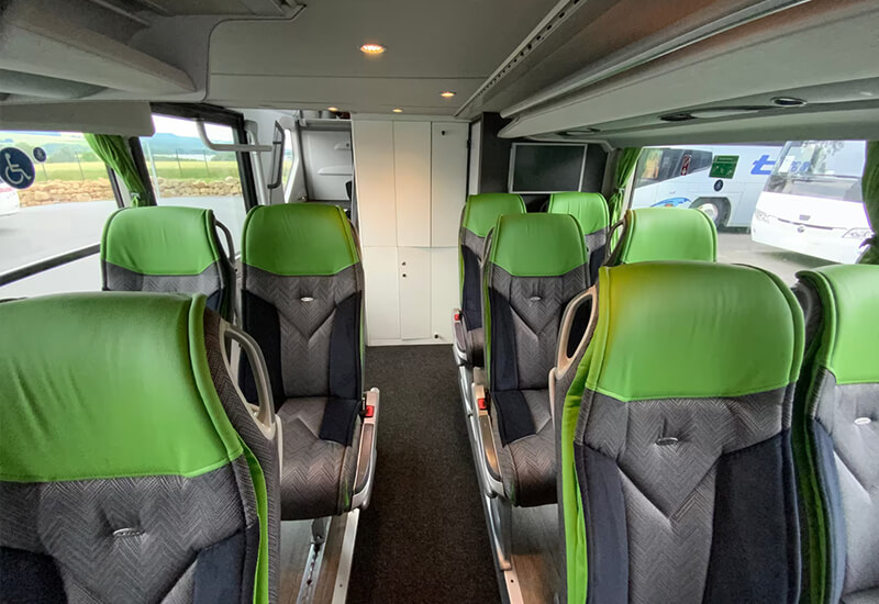 Setra double-deck coach cabin with green and grey seats