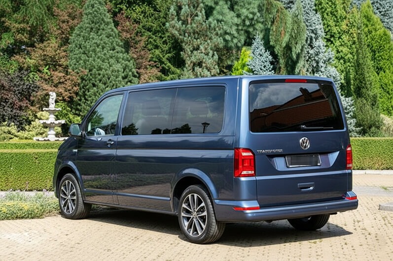 Blue Volkswagen Transporter, rear three-quarter view